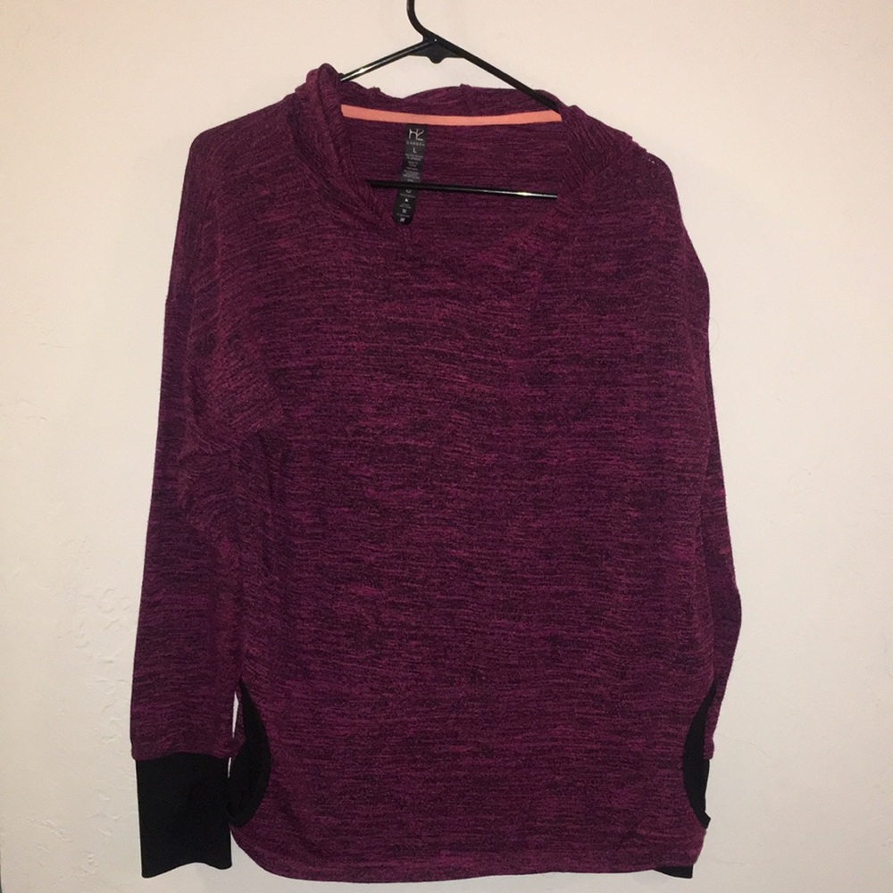 Sweater with thumb holes and pockets